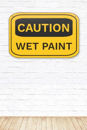 CAUTION WET PAINT