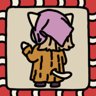The cat with a kerchief on her head