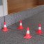 Four Traffic Cones Discussing Contemporary Art
